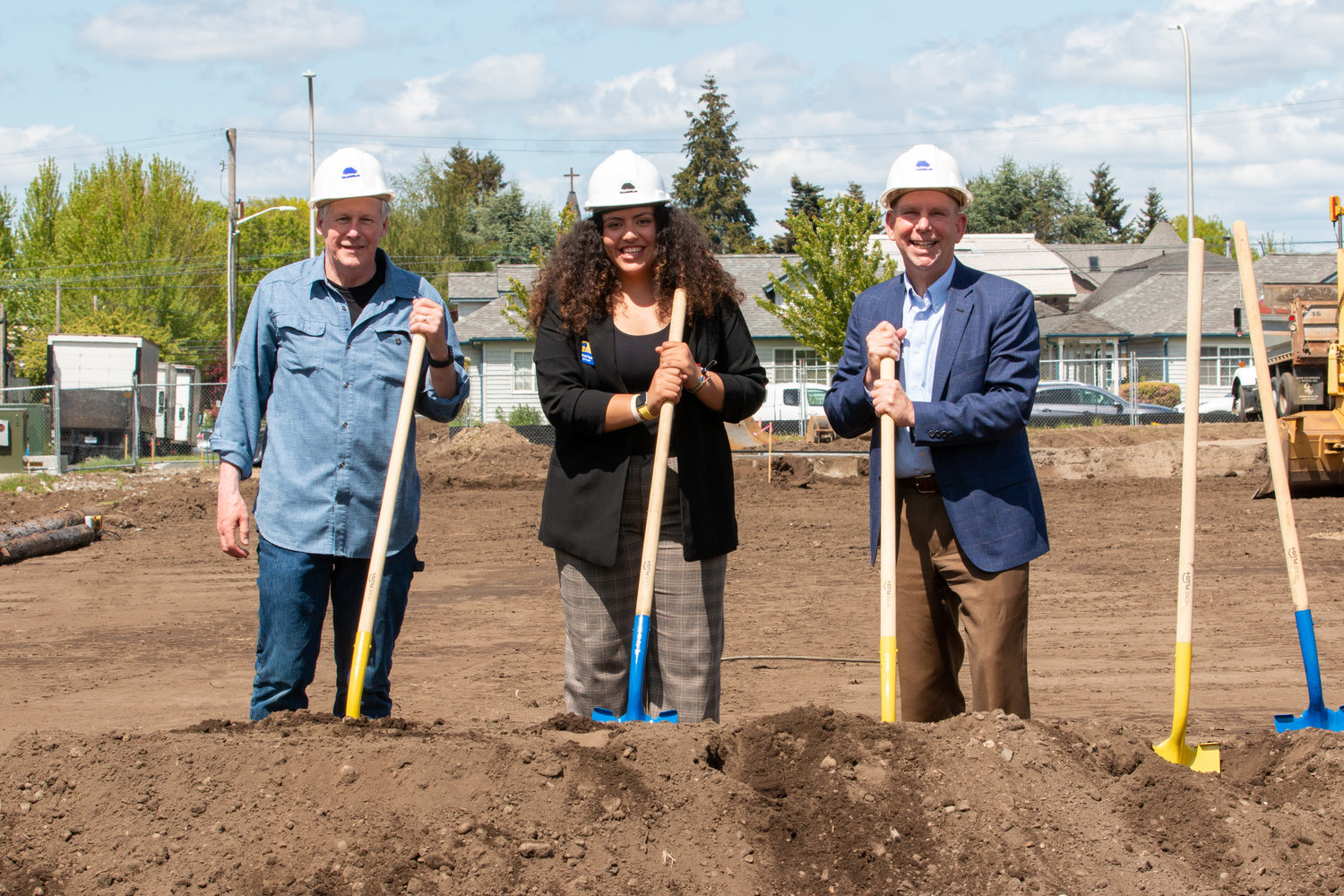 Court Stanley, Board of Trustees member since 2020; Marisol Vargas, Student Body President; and Mark Scheibmeir, Board of Trustees member since 2017, pose for a photo as the give a ceremonial groundbreaking for the Centralia College Multi-purpose Athletic Field Wednesday afternoon.